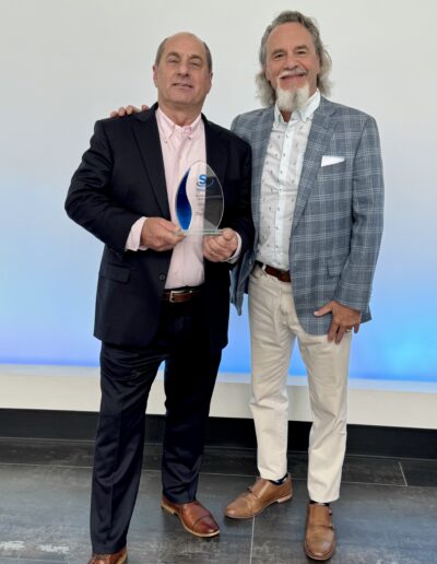 Activize's Dan O'Gurk (l) win coveted Sales Award at 2025 Shukla Medical Awards gala, with Steve Corsello (r).