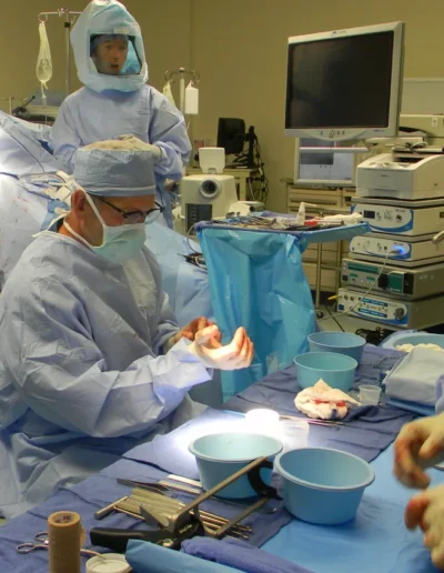 Activize's Makenna Hill and Dave Gilheany with surgical products outside hospital OR.